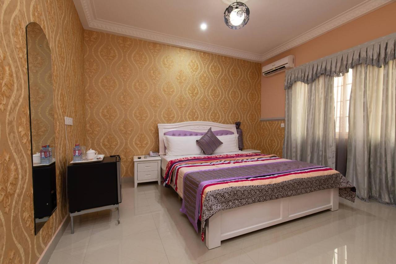 Ag Hotel And Suites Ogbodjo Kültér fotó
