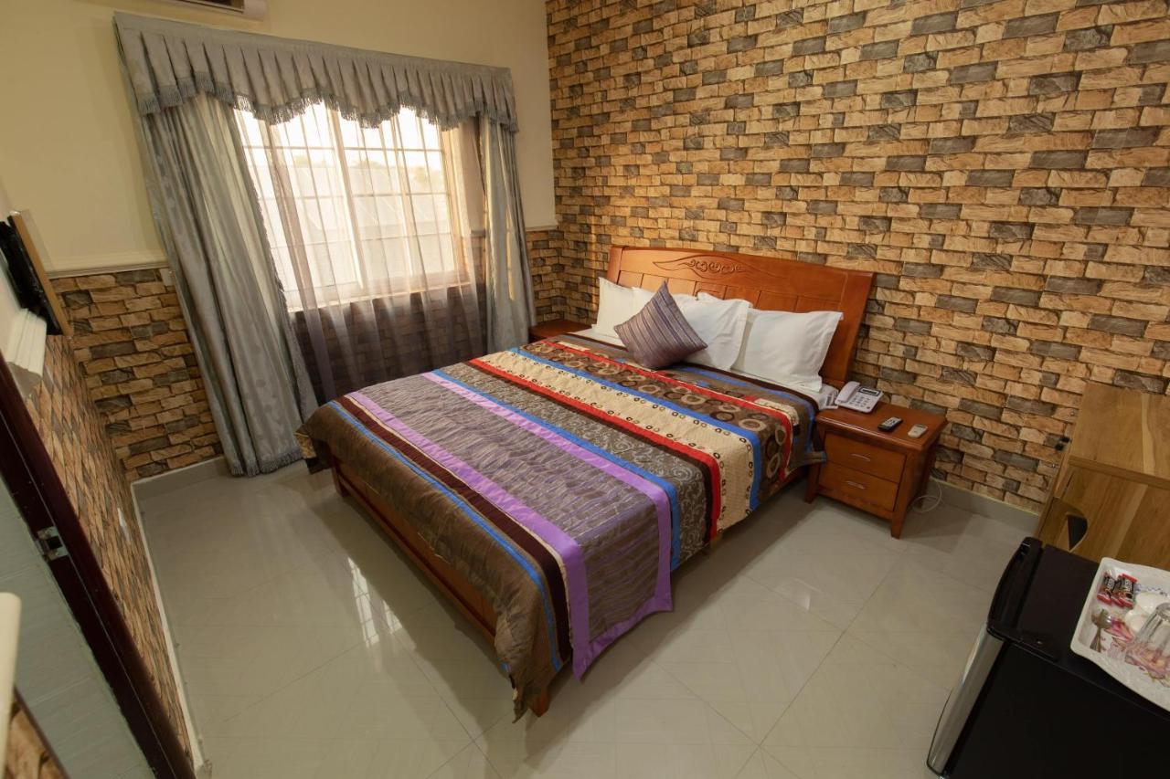 Ag Hotel And Suites Ogbodjo Kültér fotó