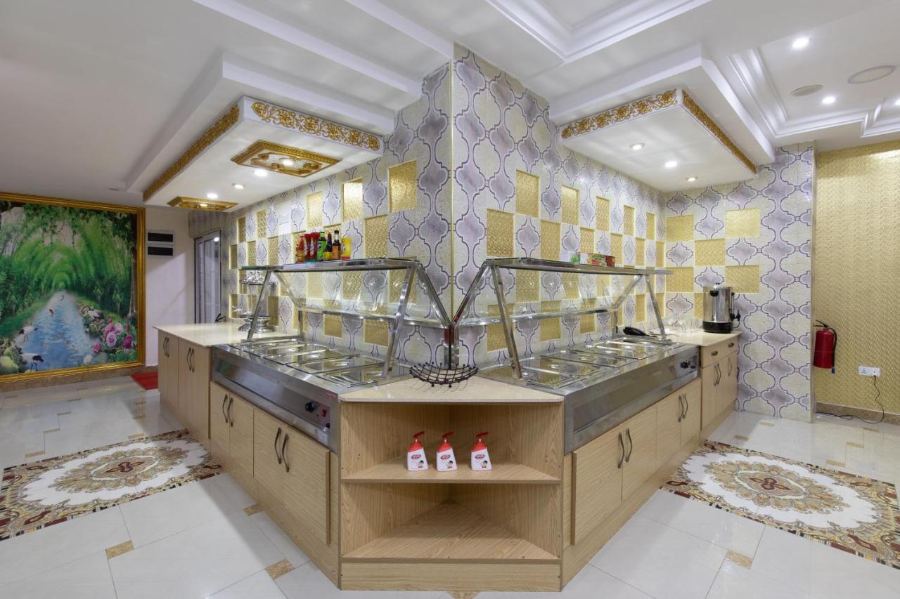 Ag Hotel And Suites Ogbodjo Kültér fotó