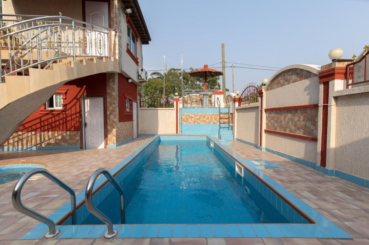 Ag Hotel And Suites Ogbodjo Kültér fotó