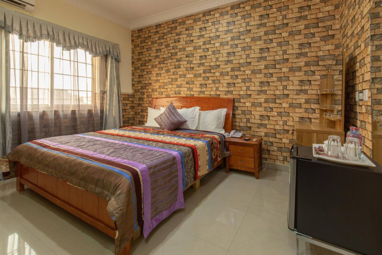Ag Hotel And Suites Ogbodjo Kültér fotó