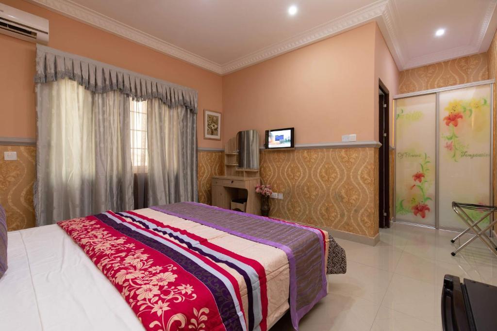 Ag Hotel And Suites Ogbodjo Kültér fotó